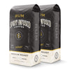 A pair of Fire Dept. Coffee 12 ounce Rum Infused Coffee packages.