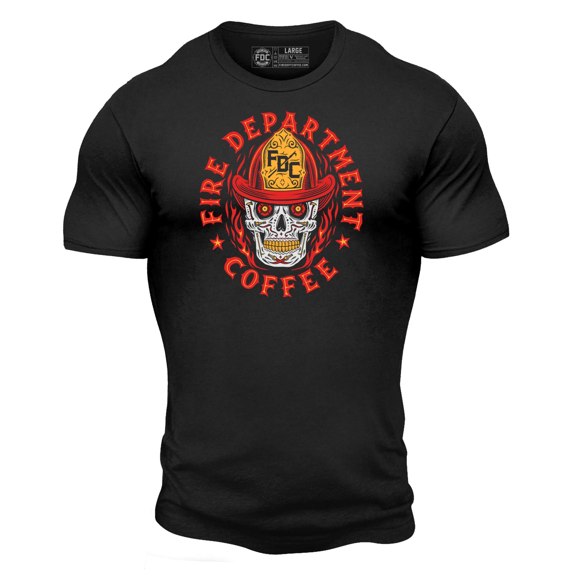 A black t shirt with a skull wearing an FDC fire helmet surrounded by flames in the center. Around the skull is text that reads "Fire Department Coffee".