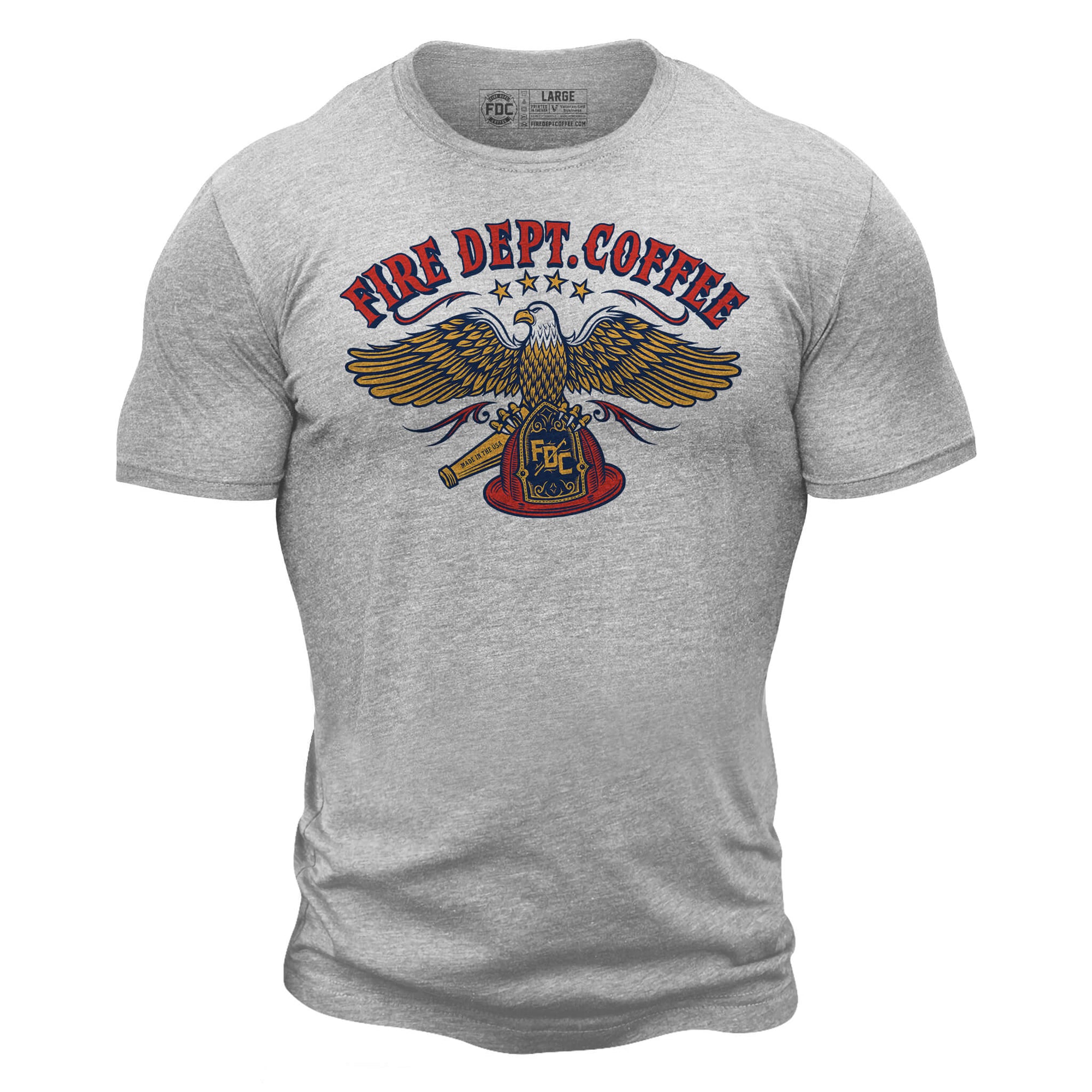 The front side of a light grey t shirt. On the chest of the t shirt is an eagle holding an FDC fire helmet. Above the eagle is text that reads "Fire Dept. Coffee"