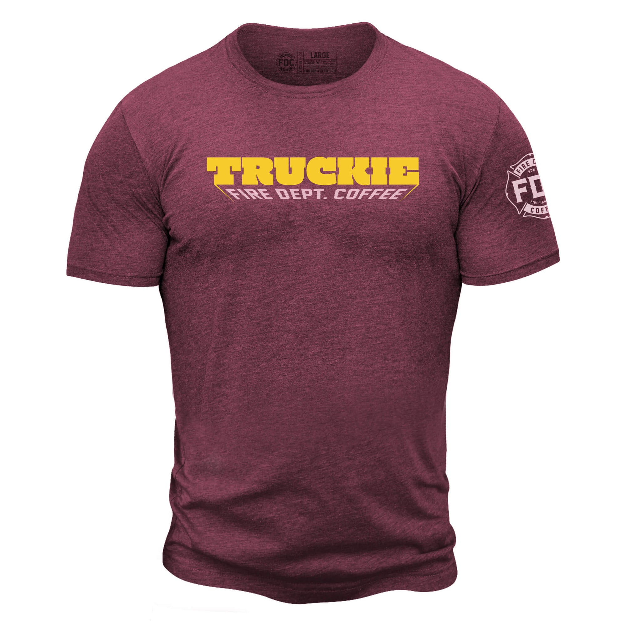 Maroon shirt with "truckie" in bold yellow lettering and "Fire Dept. Coffee" below. FDC maltese cross logo is on the sleeve.